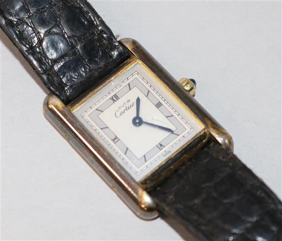 A ladys silver gilt Must de Cartier quartz wrist watch.